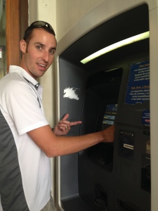 Josh using ATM machine